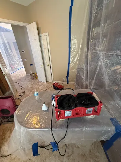 Containment and drying equipment set in a Laguna Hills home